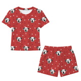 This is a Red Paws print pajama set with a relaxed t-shirt and pajama shorts covered in repeating pet faces[RedPawsRelaxedTShirtPajamaSet]