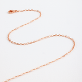 Close up of golden rose chain 