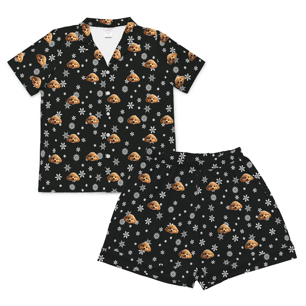 Black pajama set with dog pattern on a white background