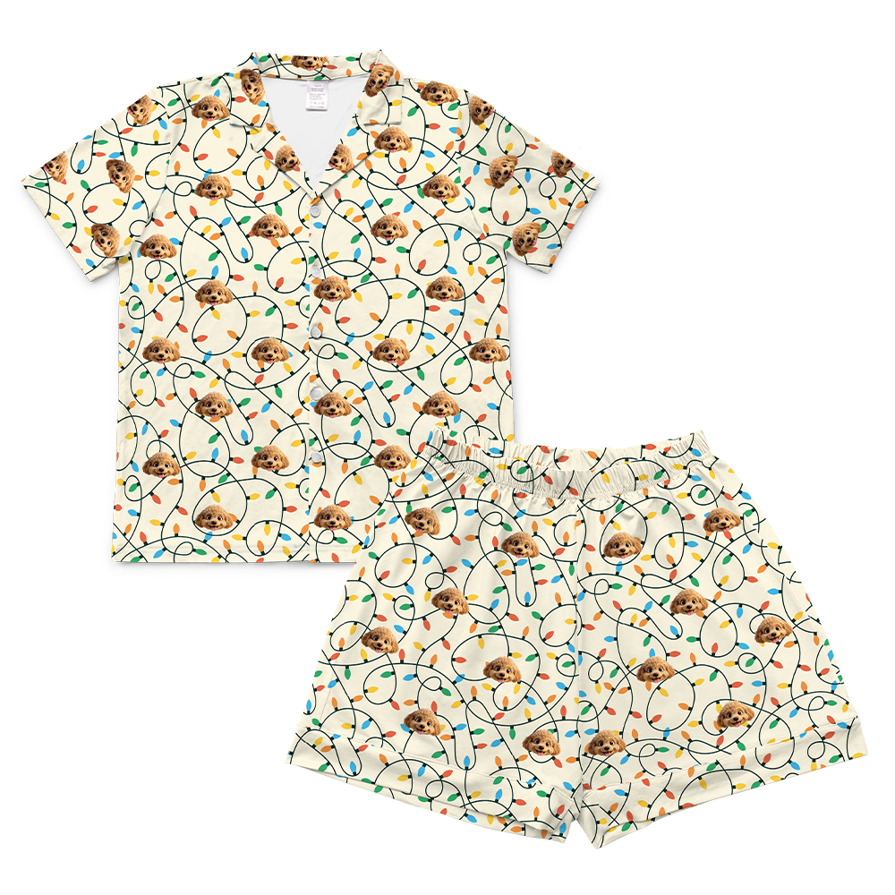 Pajama set with cat and light bulb pattern on a white background