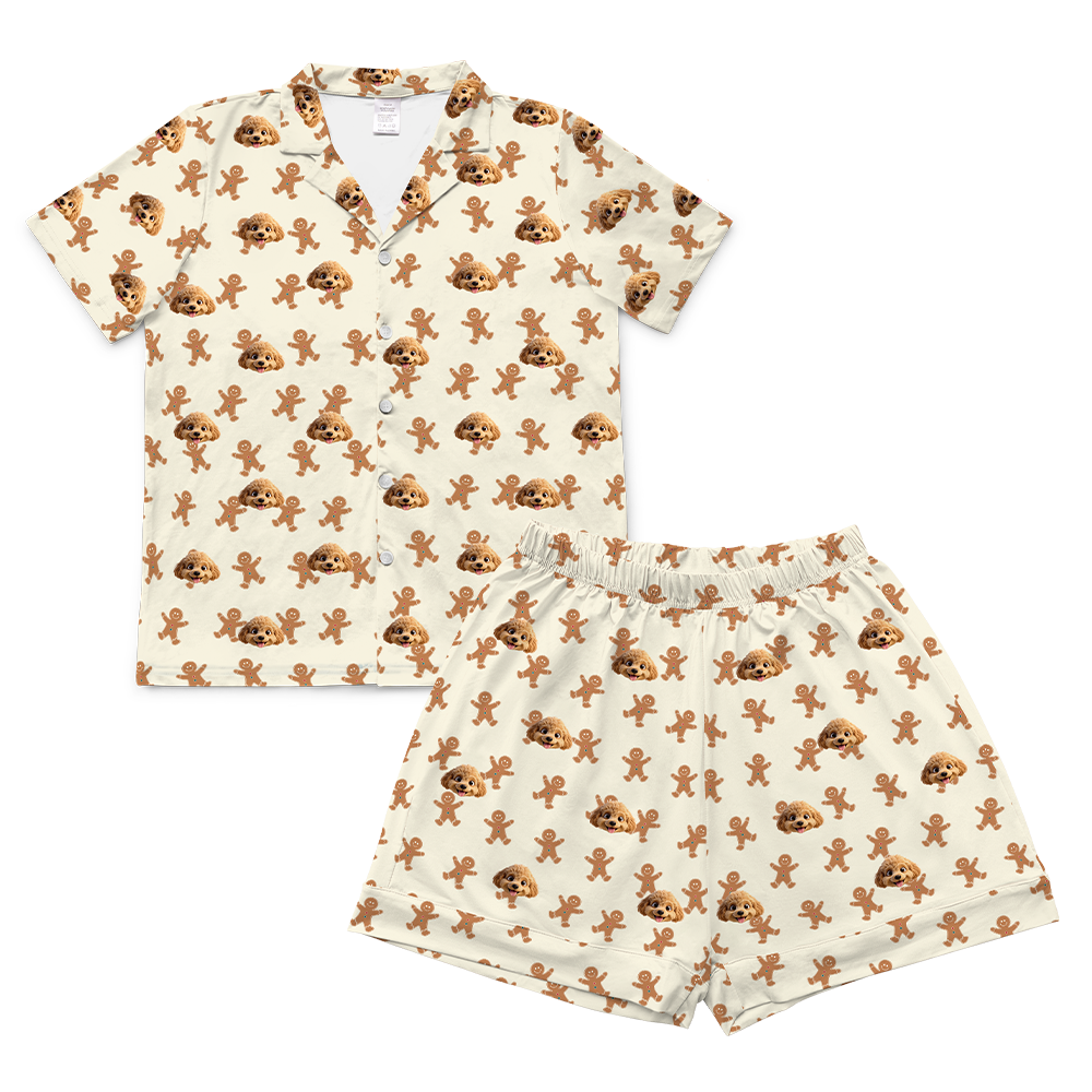 Pajama set with gingerbread man pattern on a white background