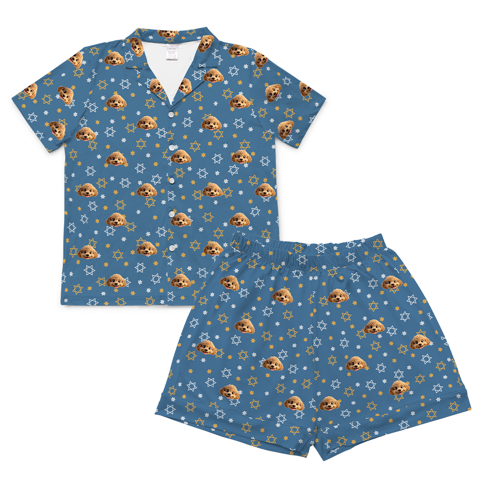 Blue pajama set with dog pattern on a white background