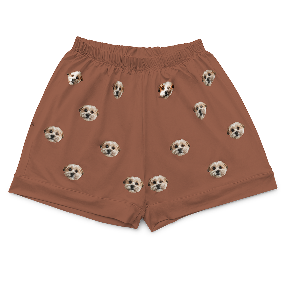 These are pajama shorts in a brown color with repeating pet faces on them[PajamaShorts($45.00)]