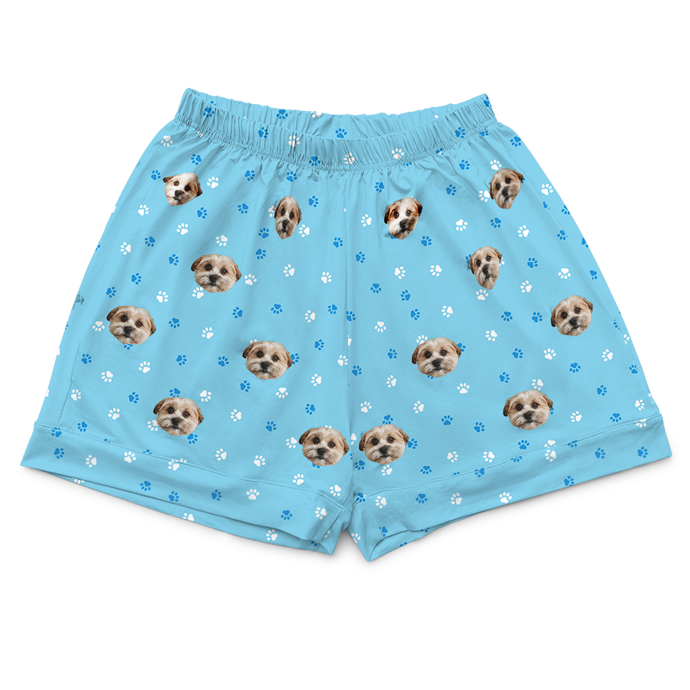 These are pajama shorts in a blue color with repeating pet faces on them[PajamaShorts]