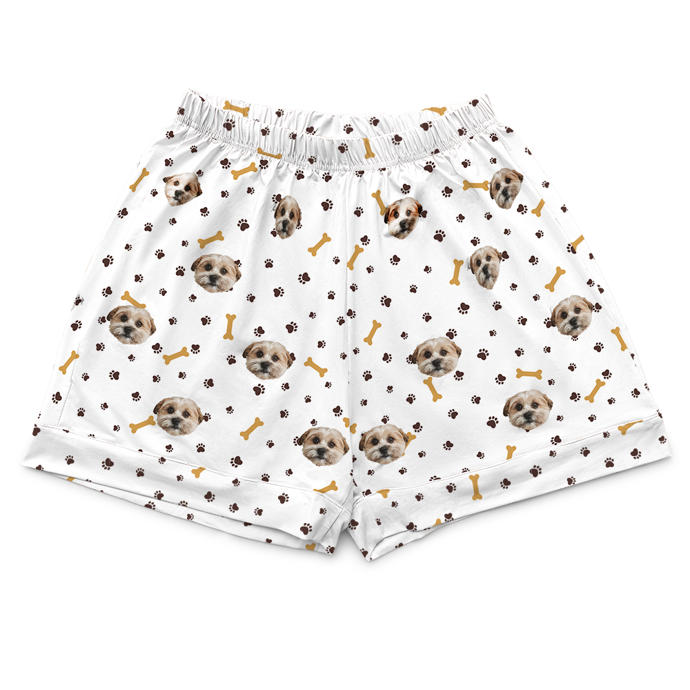 These are pajama shorts in a white color with repeating pet faces on them[PajamaShorts($45.00)]