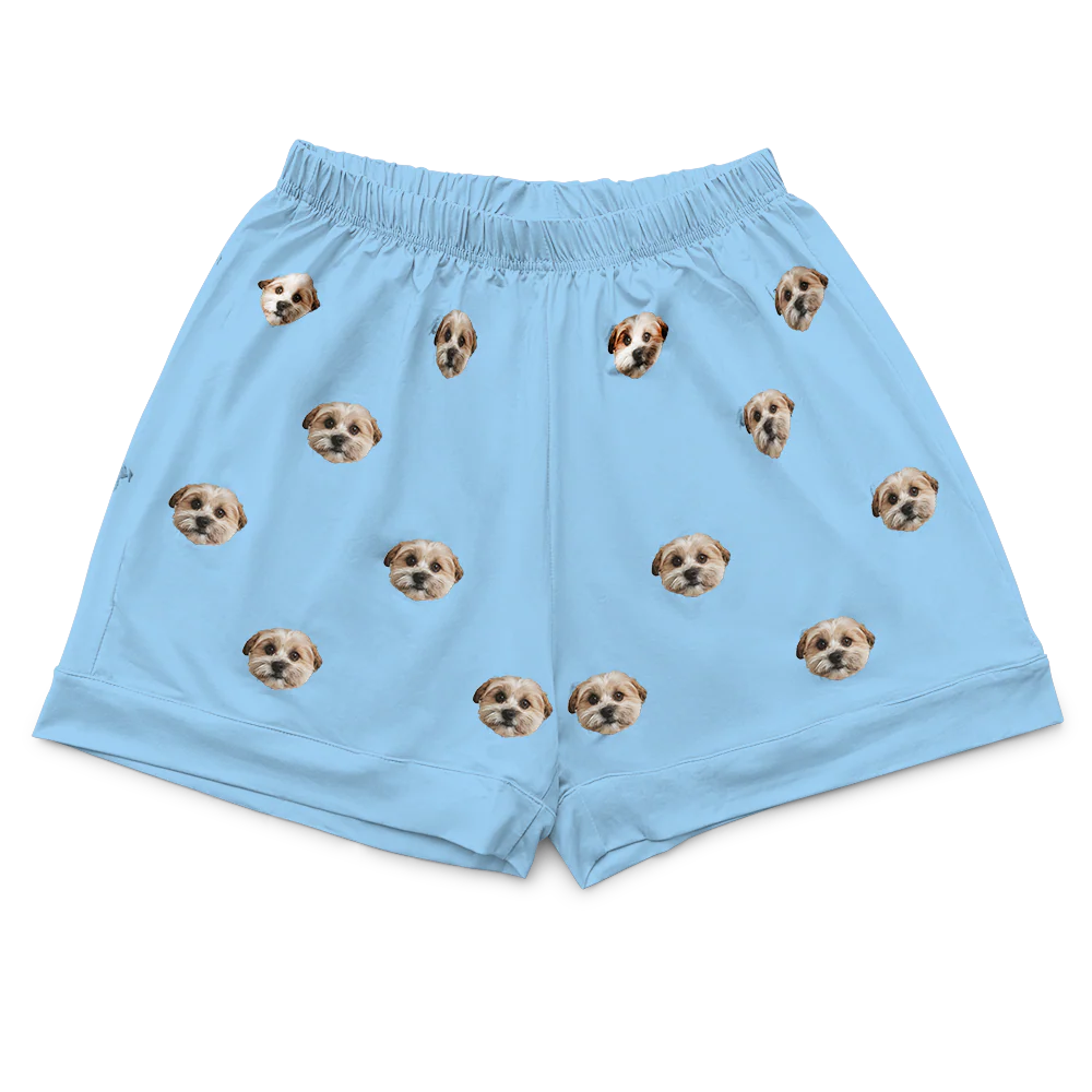 These are pajama shorts in a blue color with repeating pet faces on them[PajamaShorts]