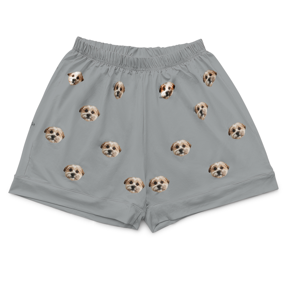 These are pajama shorts in a gray color with repeating pet faces on them[PajamaShorts]