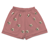 These are pajama shorts in a dusty rose color with repeating pet faces on them[DustyRosePajamaShorts($45.00)]