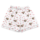 These are pajama shorts in a white color with repeating pet faces on them[PawfectlovePajamaShorts($45.00)]