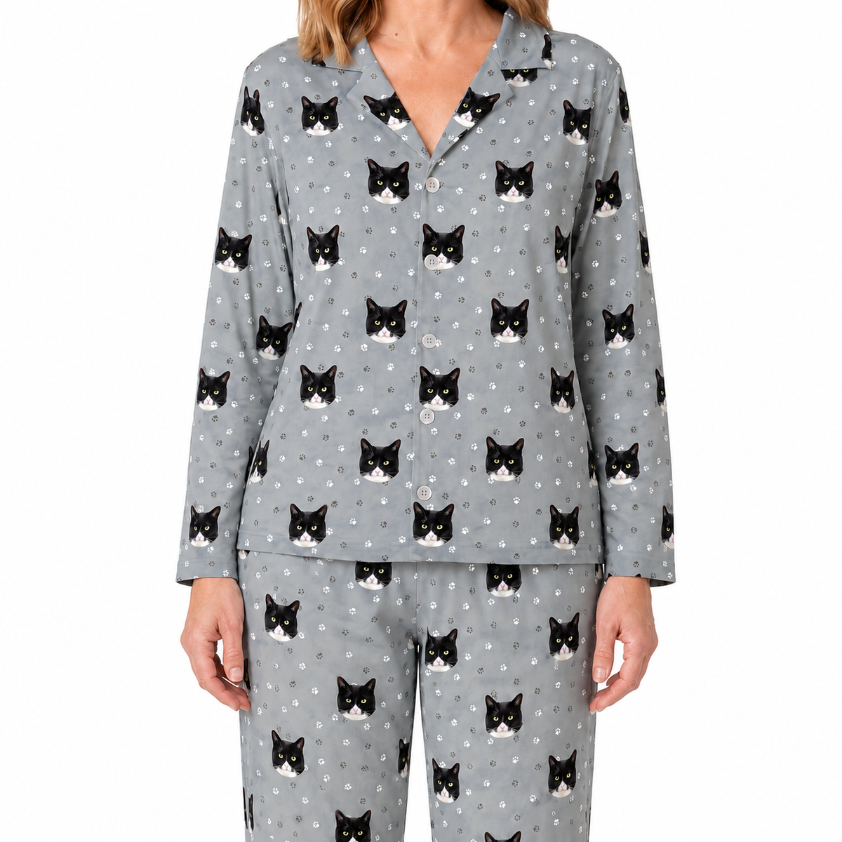 Gray pajama set with black cat pattern on a white background