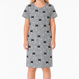 Gray nightgown with black cat pattern worn by a person on a white background