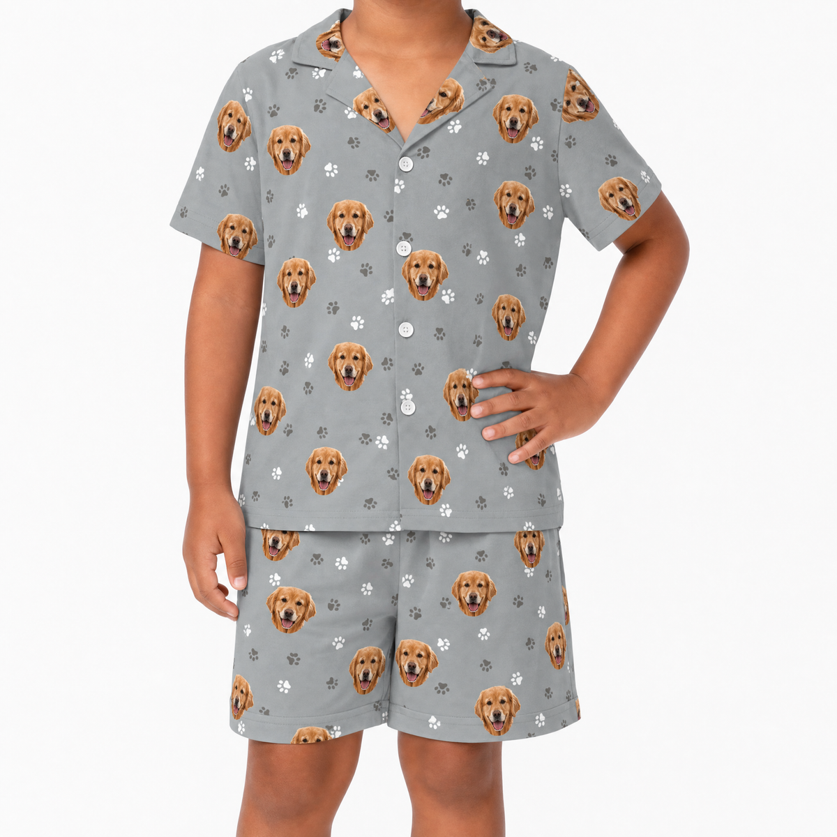 Kids gray pajama set with dog pattern on a white background