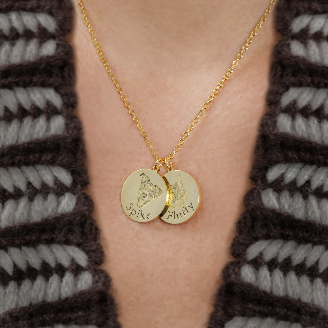 Gold necklace with 'Spike' and 'Fluffy' pet pendants on chest.