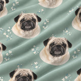 Close-up of the Vintage Bloom print showing custom pet faces among small white flowers on a sage green fabric