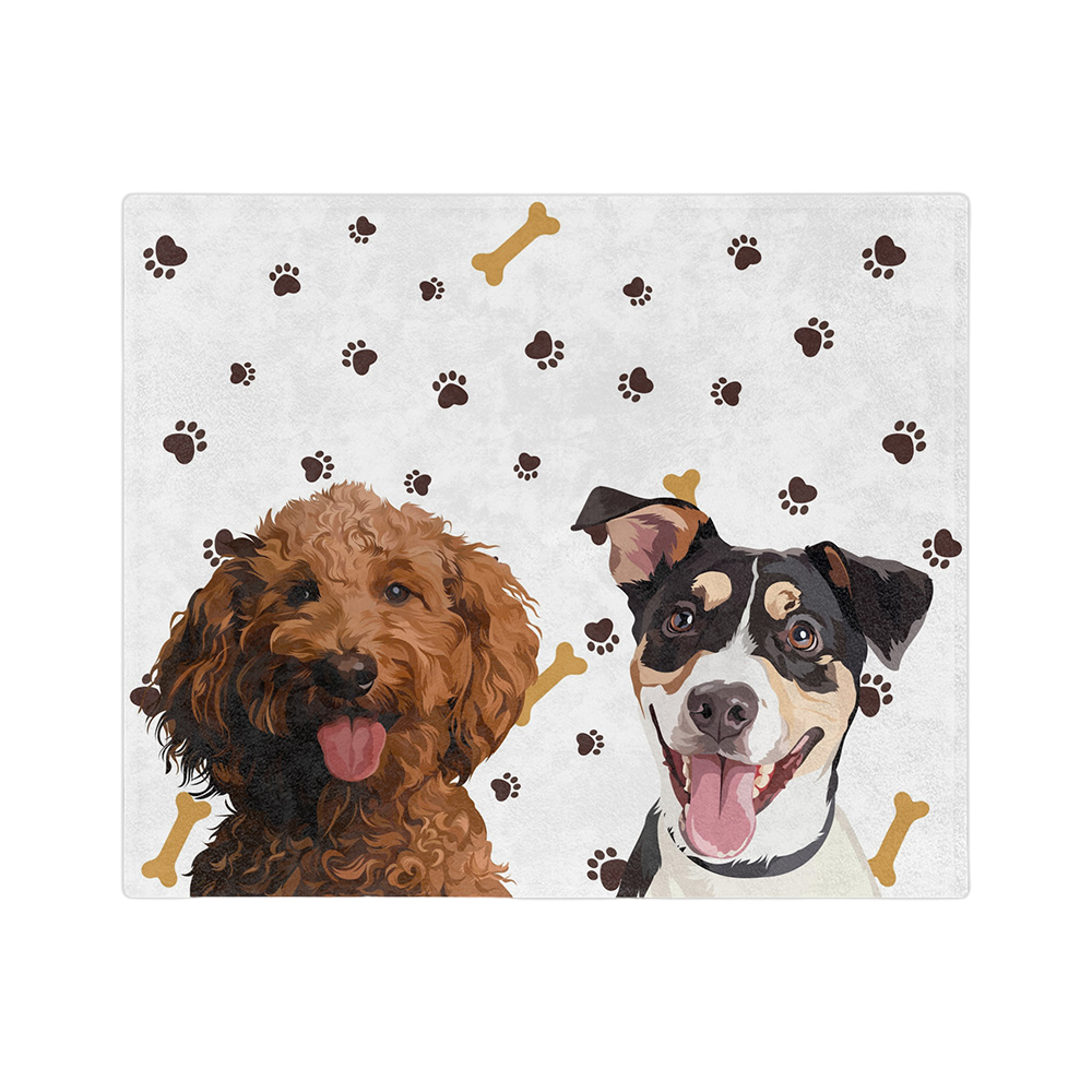 White blanket with paws and bones, featuring the illustrations of two dogs.