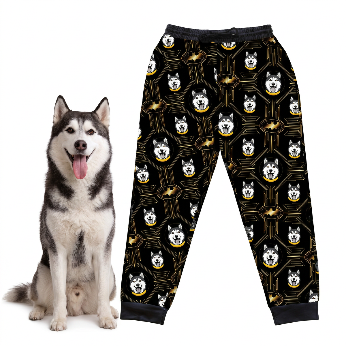 Sweatpants with Iconic Batman pattern next to a real dog on a white background